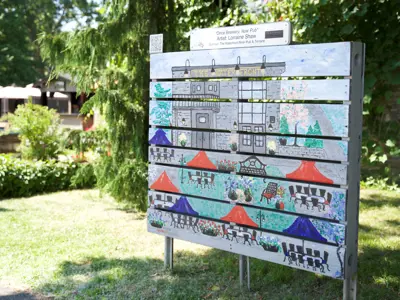A painting in a park of The Waterfront restaurant